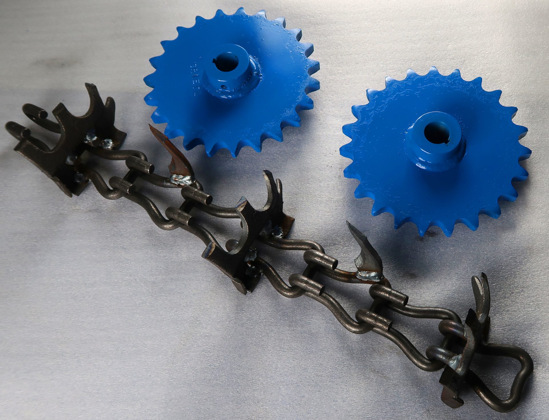 Silo unloader chain and sprockets